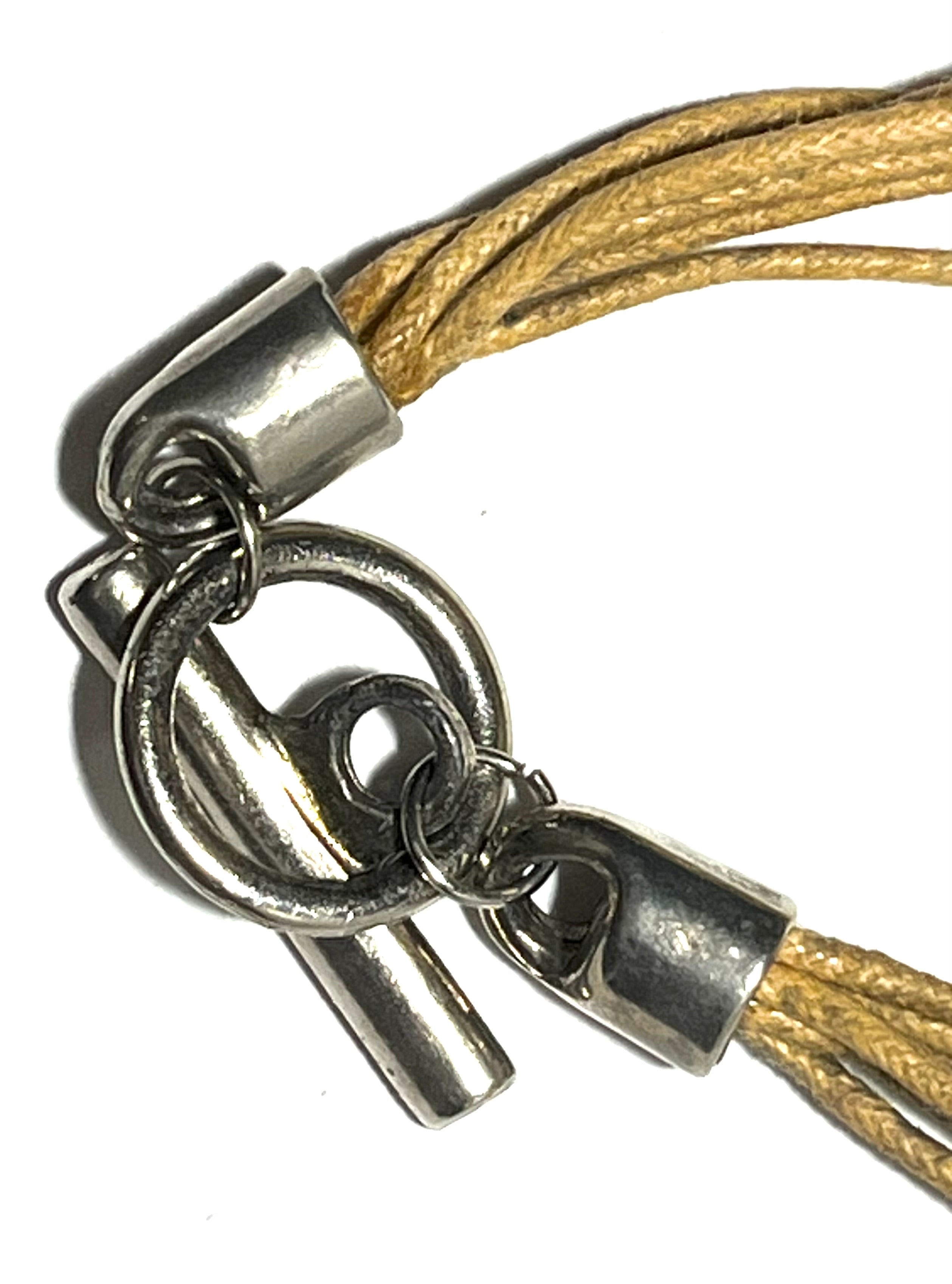 Boho Multi-Strand Cord Necklace with Hammered Silver Tone Donut Pendant