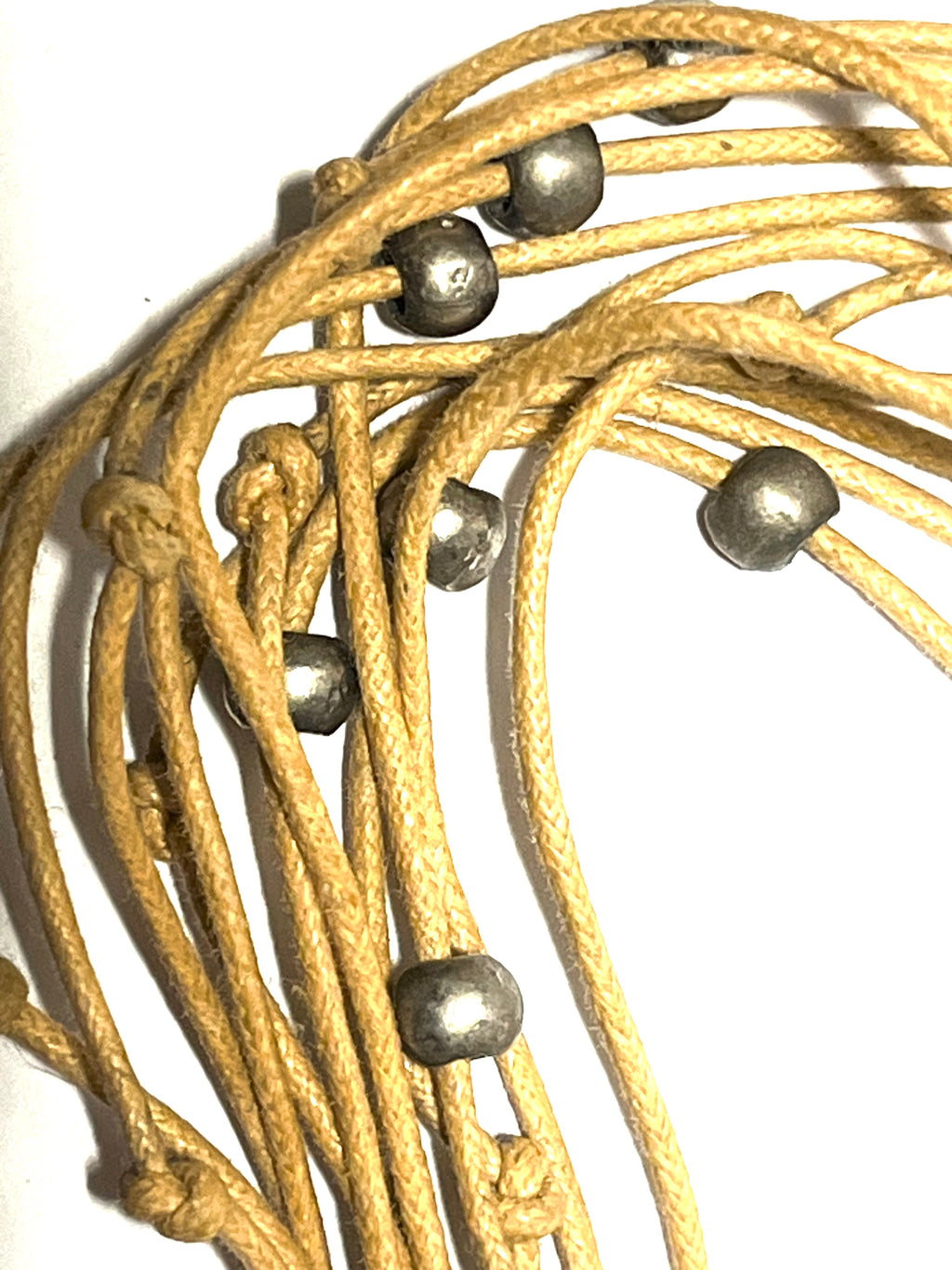 Boho Multi-Strand Cord Necklace with Hammered Silver Tone Donut Pendant